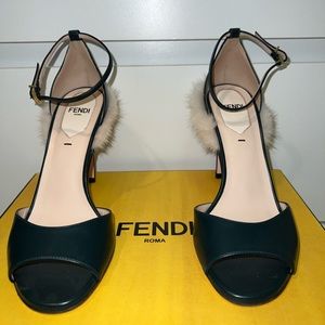 Fendi open toed heels round front with fur detailing.